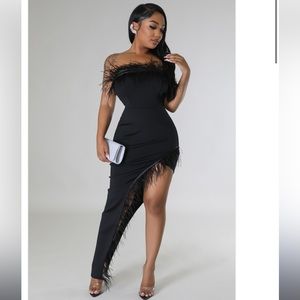 Black high low sleeveless dress with features